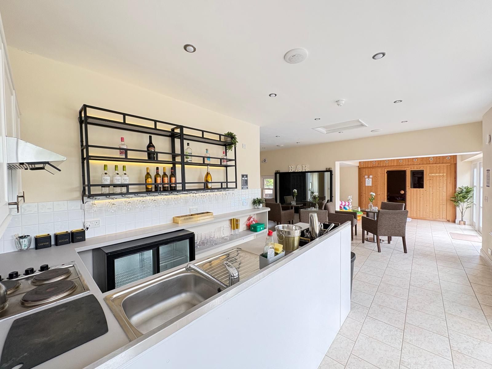 Bar and dining area with seating for shared meals